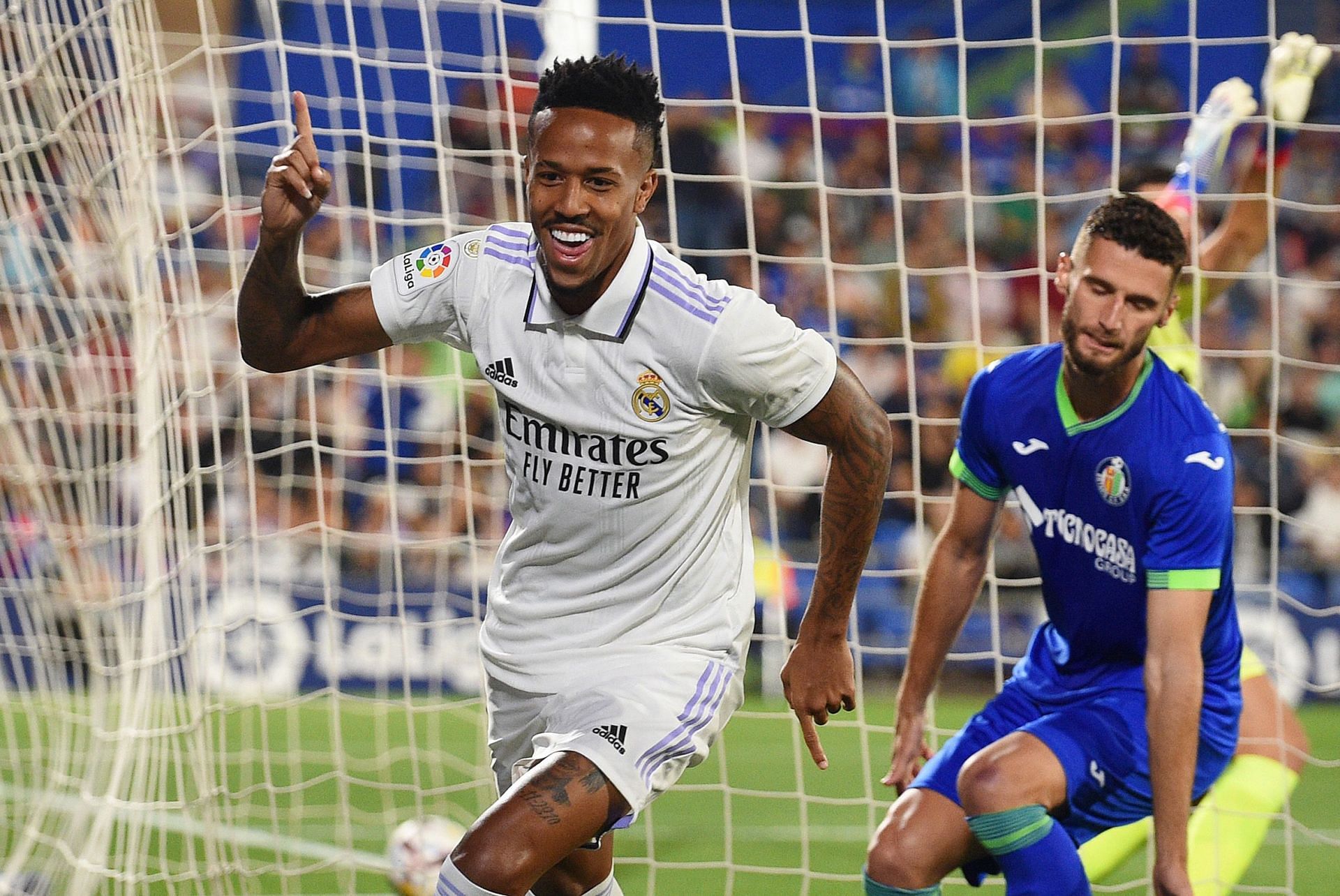 Eder Militao celebrates after scoring a goal,